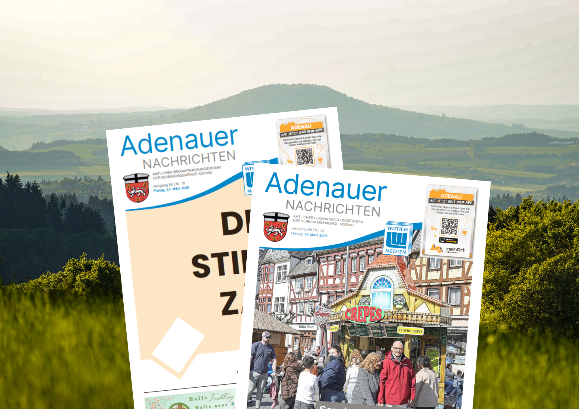 Das Foto zeigt zwei Ausgaben der Adenauer Nachrichten. Im Hintergrund ist eine sanfte, bewaldete Hügellandschaft unter hellem Himmel zu sehen.